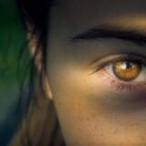 Closeup of woman's light brown right eye